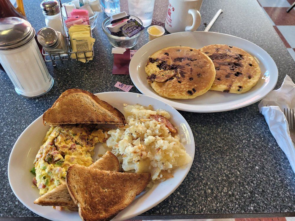 Blueberry pancakes, an omelet with home fries and rye toast